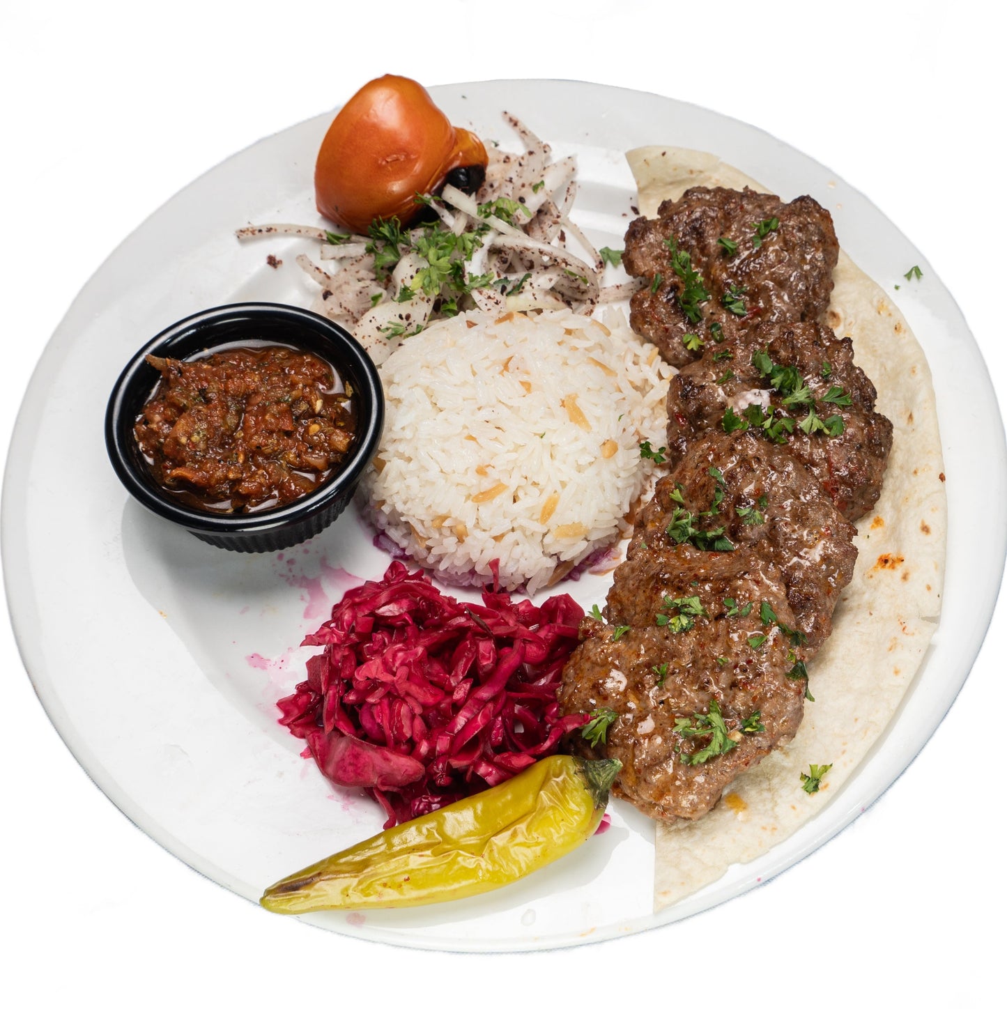Grilled Izgara Kofte Chicken served with rice, fresh salad, and traditional Turkish spices at Anatolia Turkish Restaurant Singapore