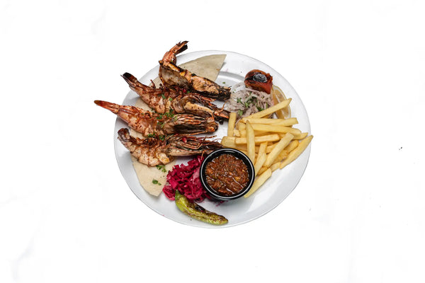 Grilled tiger prawns served with fries and sauce at Anatolia Restaurant Singapore