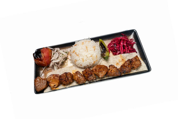 Lamb shish kebab served with rice and grilled vegetables at Anatolia Restaurant Singapore