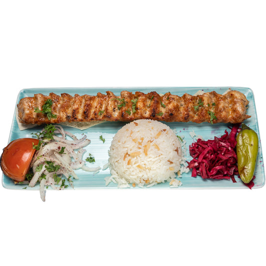Adana Chicken with aromatic rice and fresh vegetables