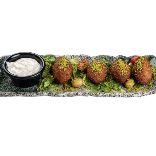 Traditional Kibbeh with a crispy bulgur and meat shell, filled with spiced minced lamb and pine nuts, served at Anatolia Turkish Restaurant Singapore