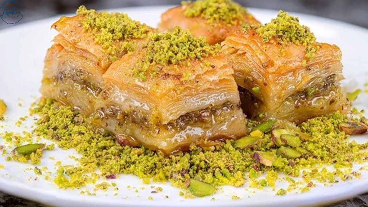 Turkish pistachio baklava cut into diamonds on a serving tray