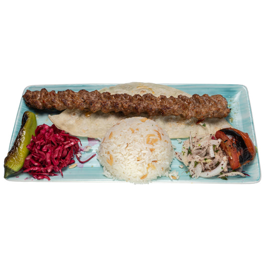 Char-grilled Adana Lamb Kebab served with rice and fresh salad at Anatolia Turkish Restaurant Singapore