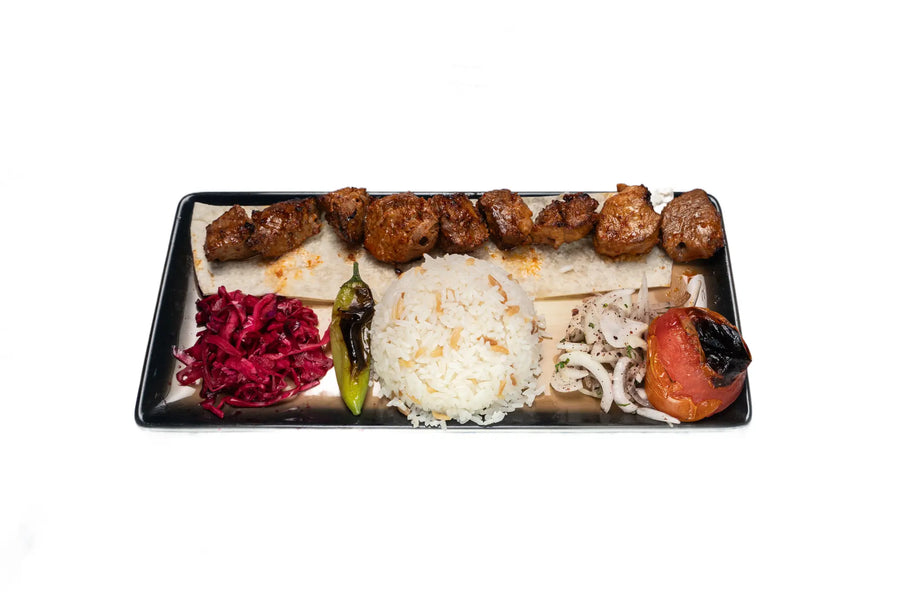 Beef shish kebab served with rice and grilled vegetables at Anatolia Restaurant Singapore