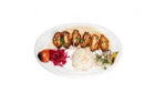 Chicken wing kebab served with rice and grilled vegetables at Anatolia Restaurant Singapore