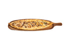 Lamb pide served on a wooden board at Anatolia Restaurant Singapore