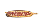 Pepperoni pide served on a wooden board at Anatolia Restaurant Singapore