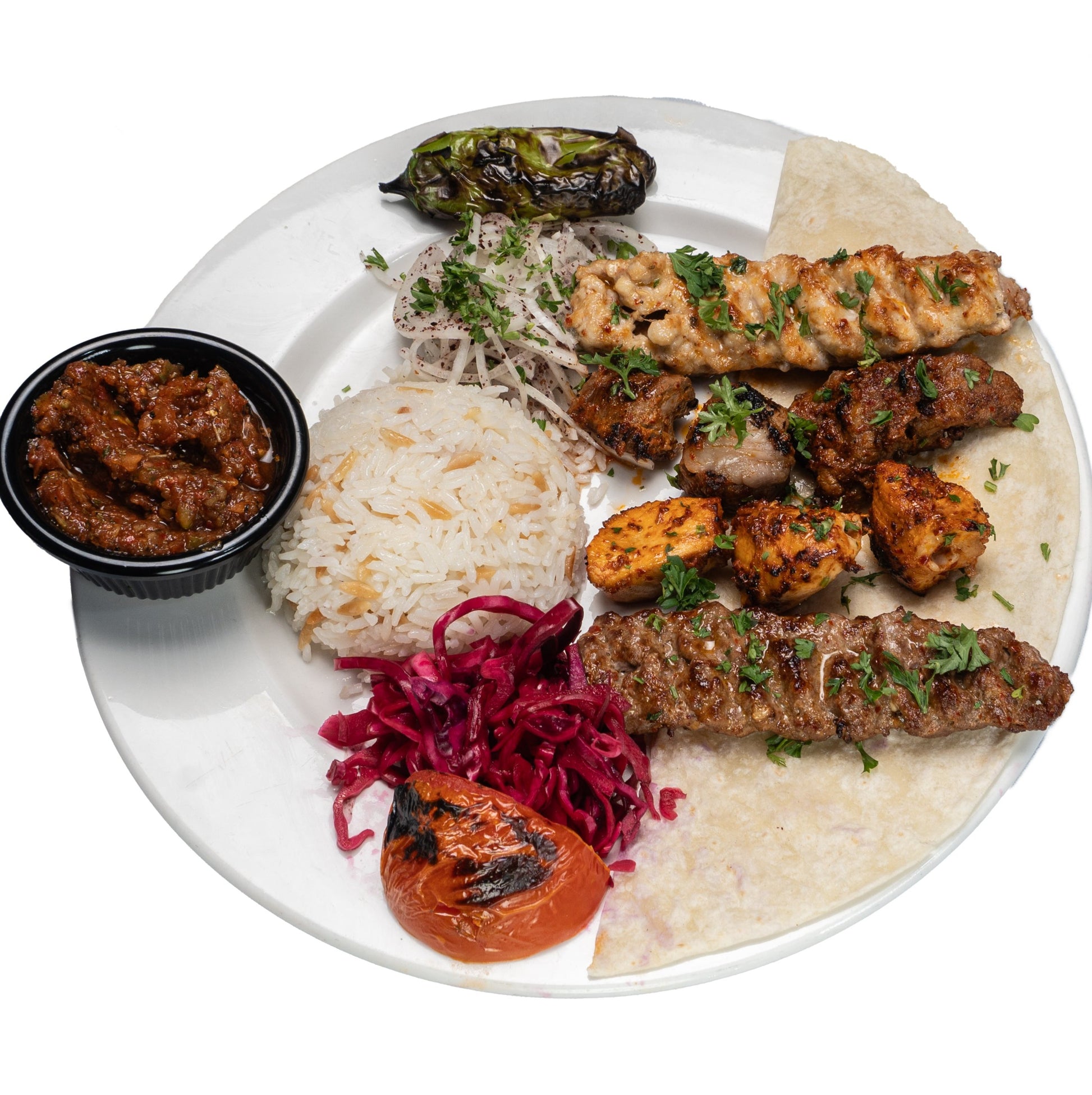 Special Mix Grill platter for one, featuring a selection of grilled meats with rice and fresh salad, served at Anatolia Turkish Restaurant Singapore