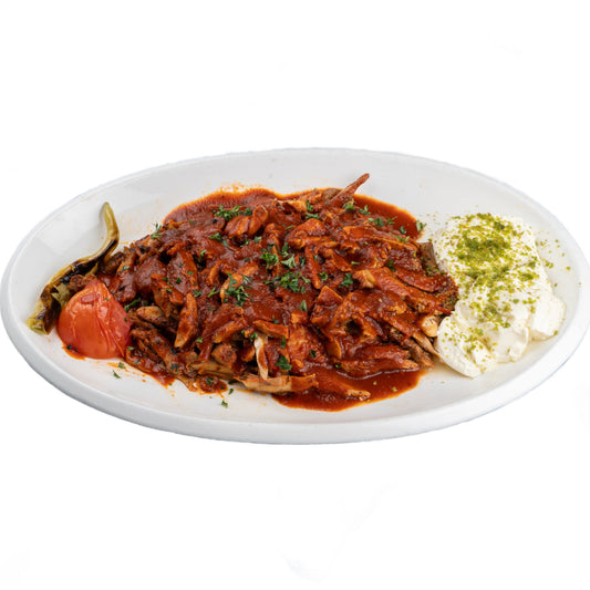 Chicken Iskender Kebab with tender grilled chicken over pita bread, topped with yogurt and tomato sauce, served at Anatolia Turkish Restaurant Singapore